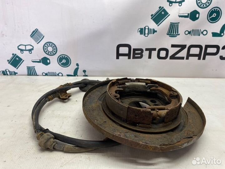 Механизм ручного тормоза задний левый Mitsubishi