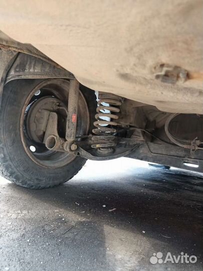 Задняя балка Рено Логан 1