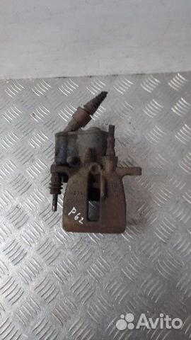 Суппорт тормозной задний левый Audi A6 универсал