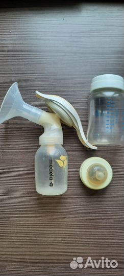 Молокоотсос medela ручной
