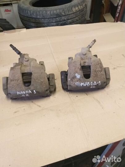 Суппорт передний мазда 3 bk