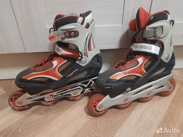 Роликовые коньки