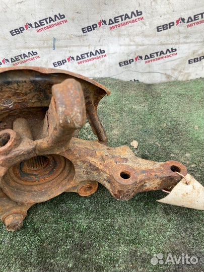 Кулак поворотный передний левый Nissan Almera