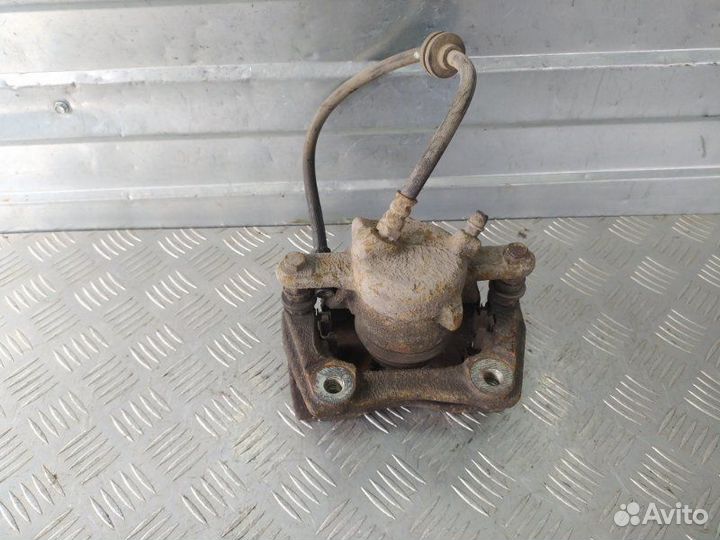 Суппорт тормозной передний правый Renault Duster