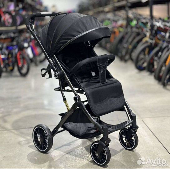 Коляска с перекидной ручкой lux mom