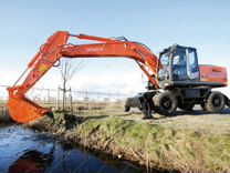 Аренда экскаватора колесного Hitachi 210W