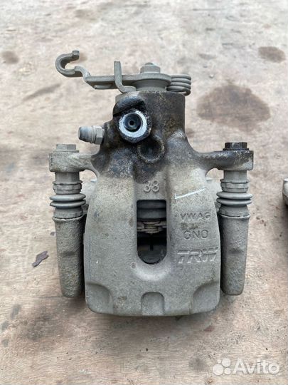 Суппорт тормозной задний Skoda Octavia A7