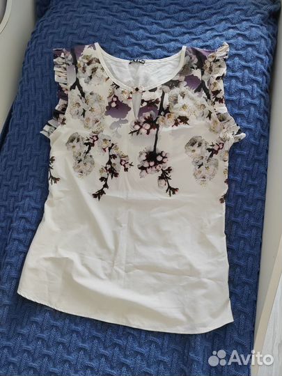 Блузка без рукавов