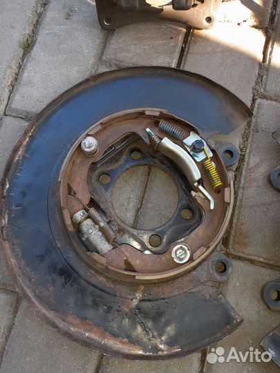 Задние тормоза на лансер 10