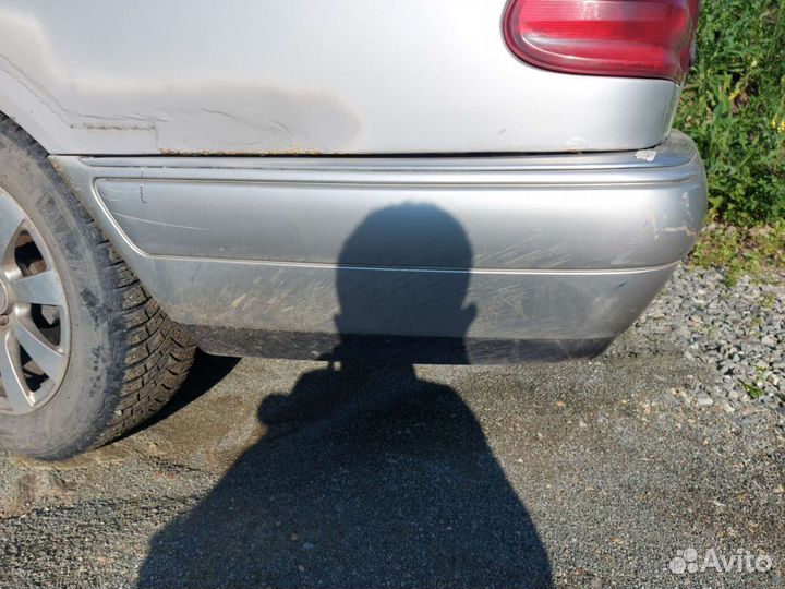 Задний бампер w210