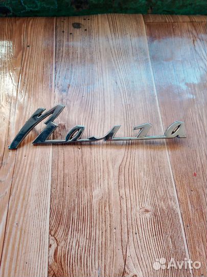 Газ 21 эмблема