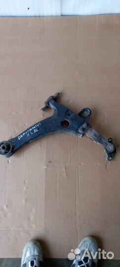 Рычаг подвески нижний передний левый Kia Magentis