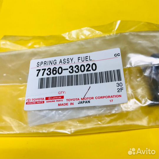 Пружинка лючка бензобака toyota 77360-33020