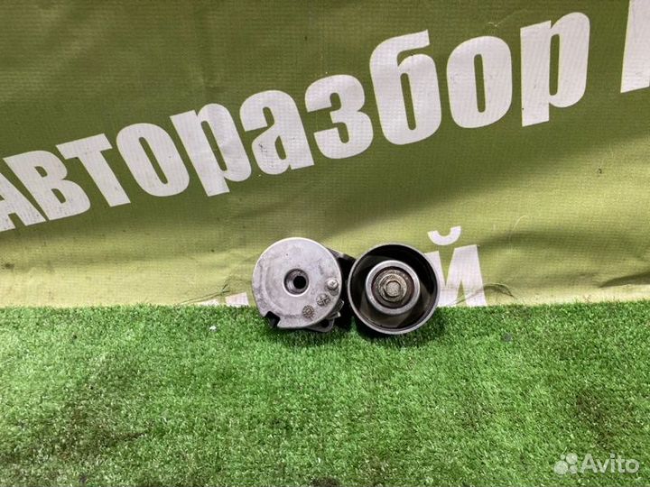 Натяжитель ремня генератора Nissan Qashqai J10