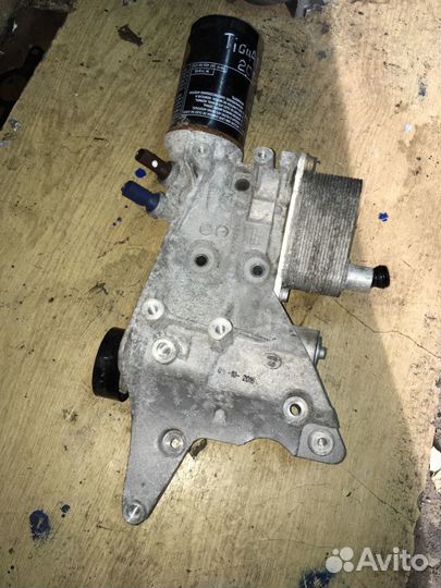 Корпус масляного фильтра 06J903143AH