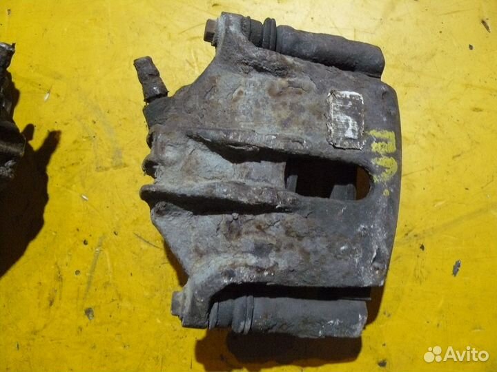 Суппорт тормозной передний Peugeot 307