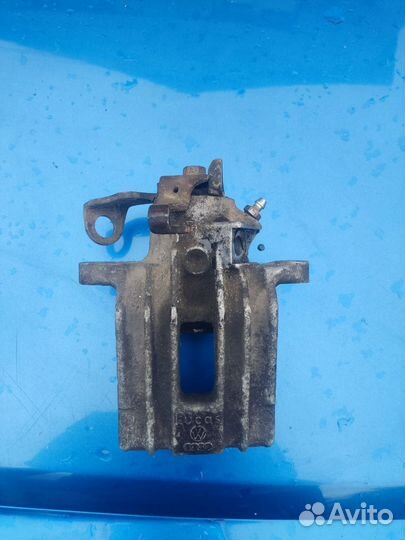 Суппорт тормозной правый задний Skoda Octavia А4