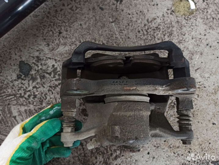 Суппорт тормозной передний правый VW Golf 7