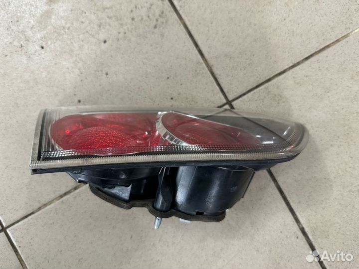 Левый внутренний фонарь Mitsubishi Lancer 10 9091