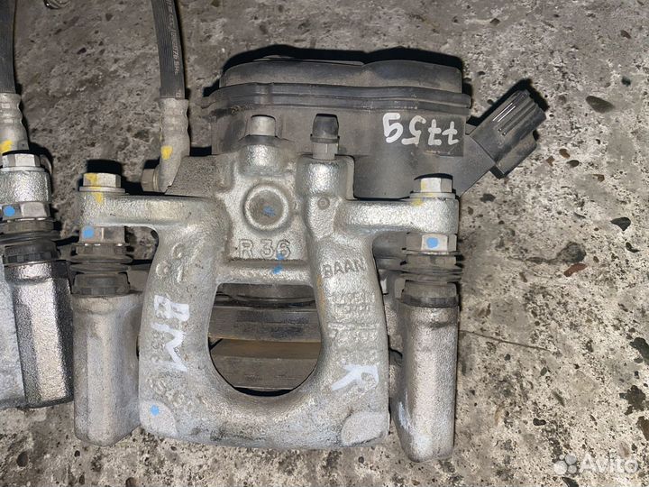 Суппорт тормозной задний левый правый Mazda 3-6