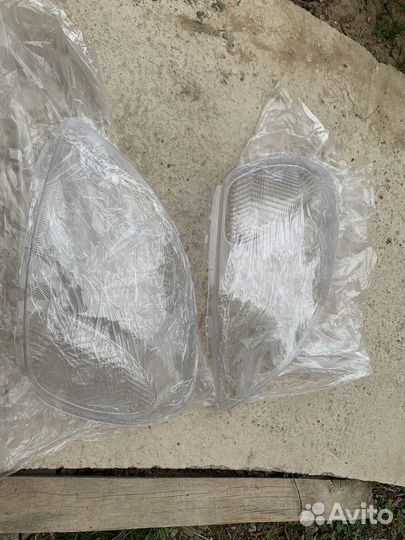 Стекла фар vitz