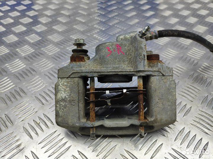 Суппорт задний правый Mitsubishi Pajero Sport 2