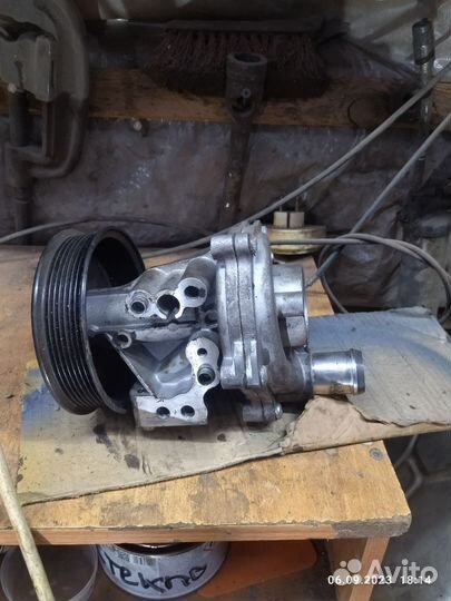 Помпа водяная форд транзит 2.4l