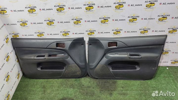 Обшивки дверей передние Lancer 9