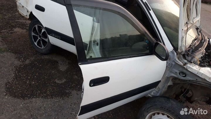 Дверь правая передняя toyota carib ae114