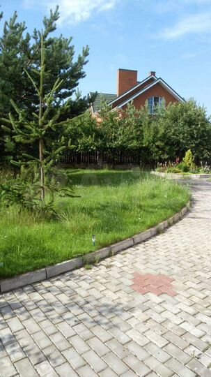 Коттедж 274 м² на участке 15 сот.