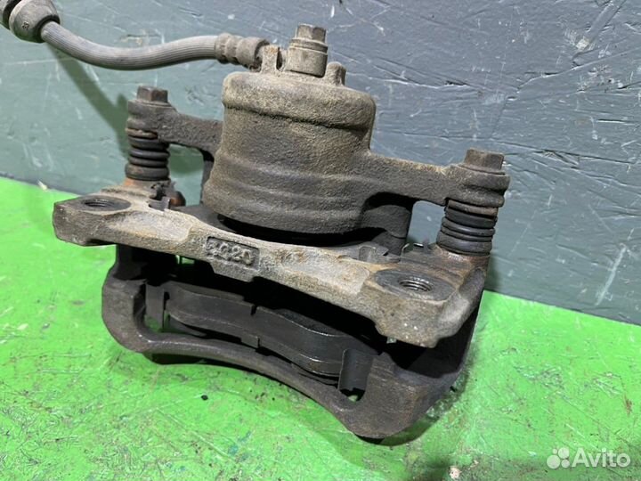 Суппорт левый Chevrolet Aveo T250 1.5 А15S3 2008