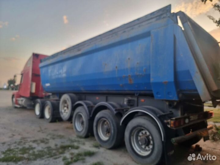 Freightliner FLC 120 с полуприцепом, 2002