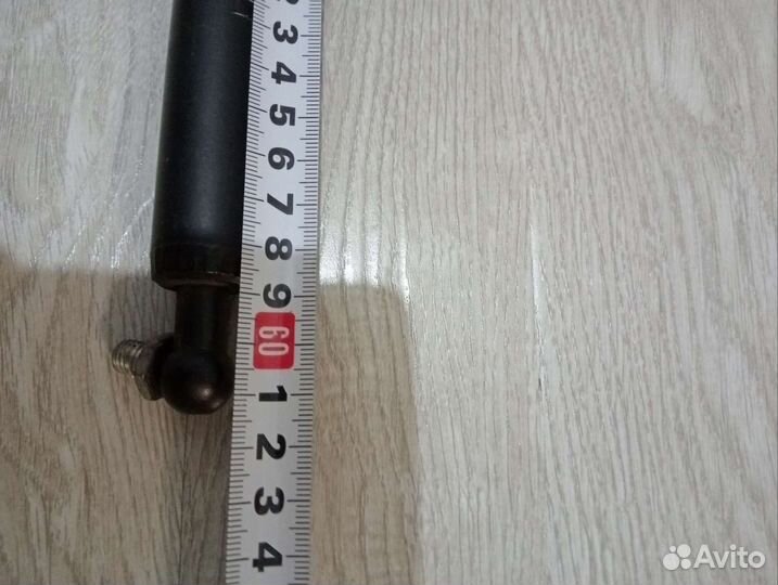 Газовые упоры багажника калина