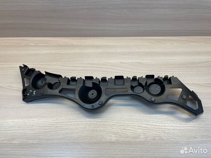 Кронштейн бампера задний левый Renault Logan