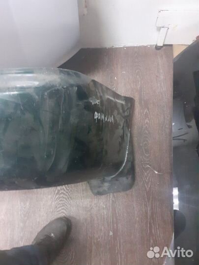 Бампер задний Mazda Familia