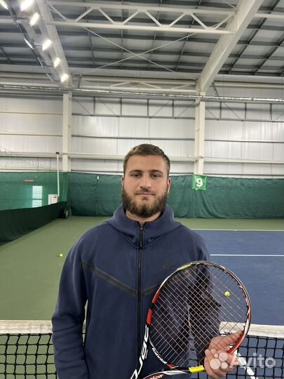 Тренер по большому теннису