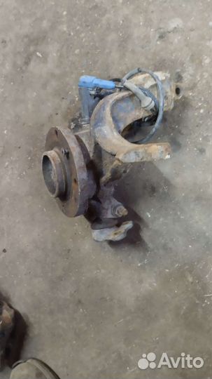 Кулак поворотный передний левый Peugeot 207