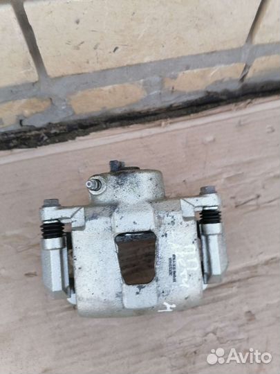 Суппорт передний правый Chevrolet Lacetti