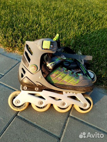 Роликовые коньки