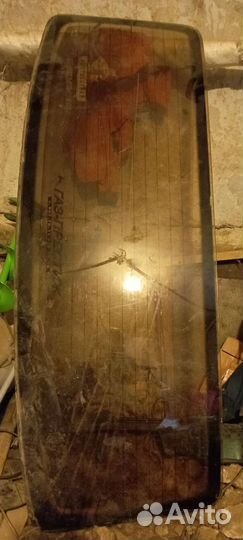 Стекло заднее Волга 3110