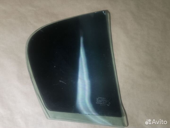 Стекло задней левой двери Opel Astra H седан