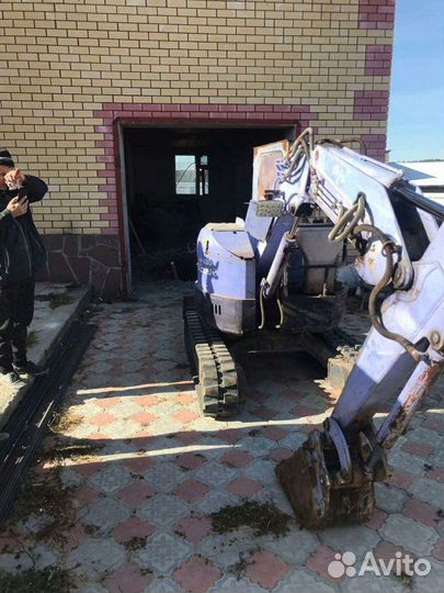 Услуги миниэкскаватора