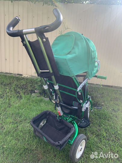 Трехколесный велосипед с ручкой