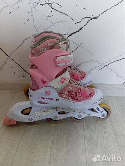 Роликовые коньки