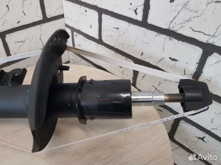 Автомобильный амортизатор киа передний лев