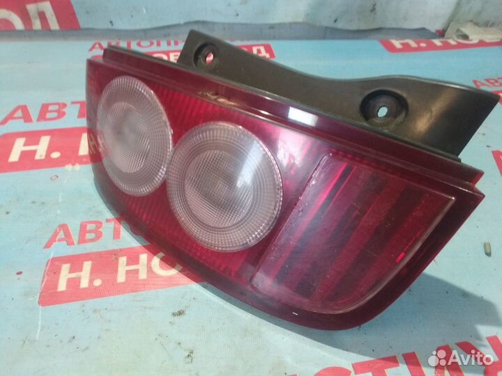 Фонарь задний левый Ниссан Микра