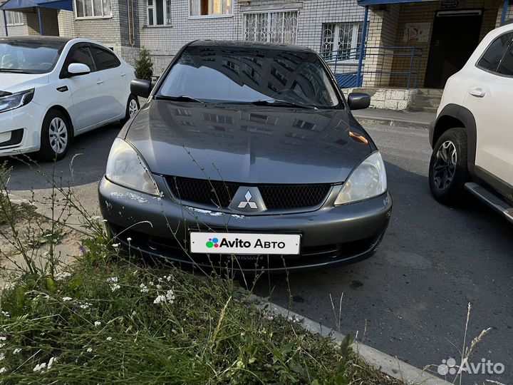 Mitsubishi Lancer 1.6 МТ, 2006, 200 000 км