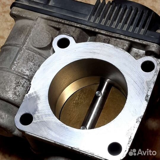 Дроссельная заслонка Nissan Almera b10