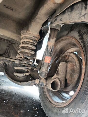 Задняя балка Рено Логан 1