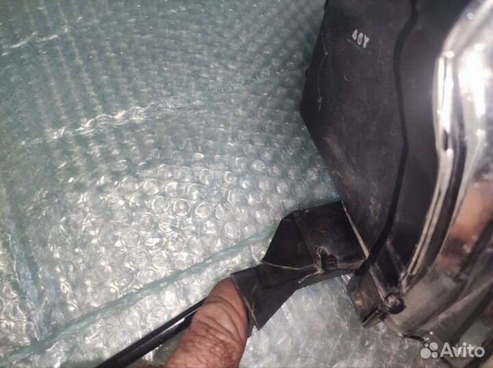 Фара левая на Митсубиши Паджеро 4